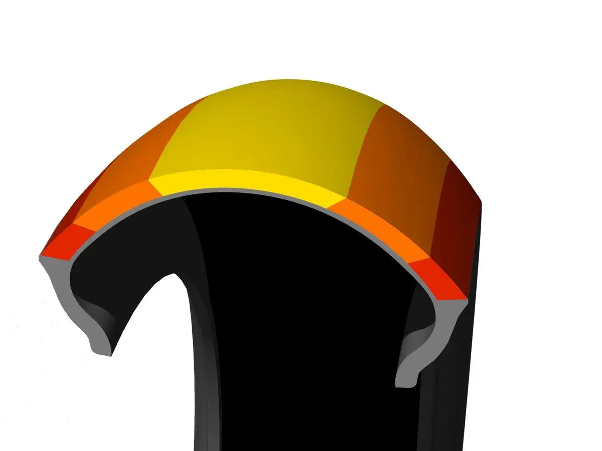 Corte transversal de un neumático con capas de colores, mostrando la tecnología que inspira las **Bridgestone S21 opiniones**.