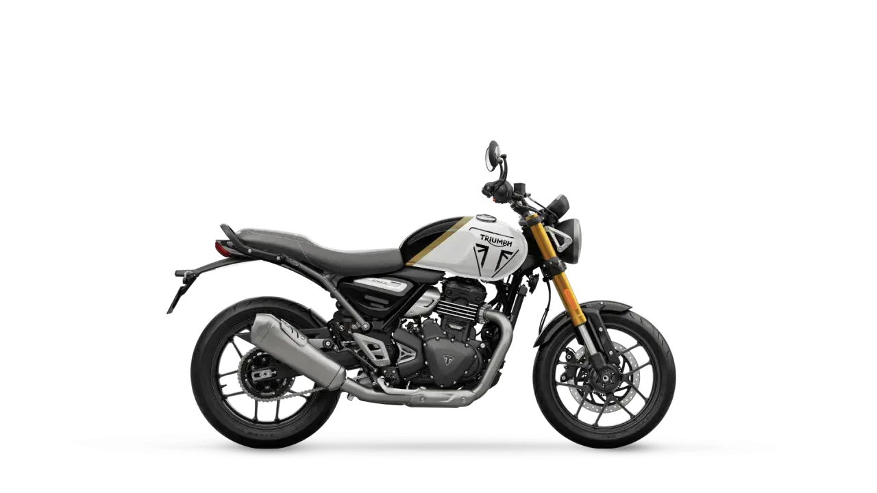 Triumph Speed 400 ficha técnica: moto estilo scrambler, blanca con detalles dorados y negros, horquilla dorada.