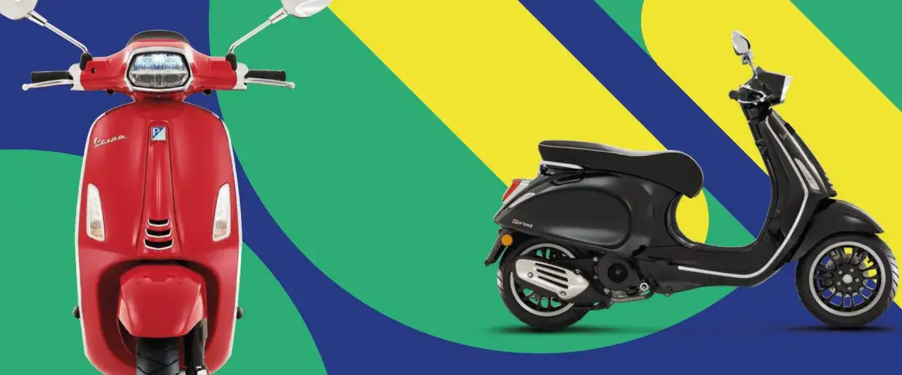 Dos modelos Vespa 125, uno rojo y otro negro, destacan sobre un fondo de colores vibrantes.