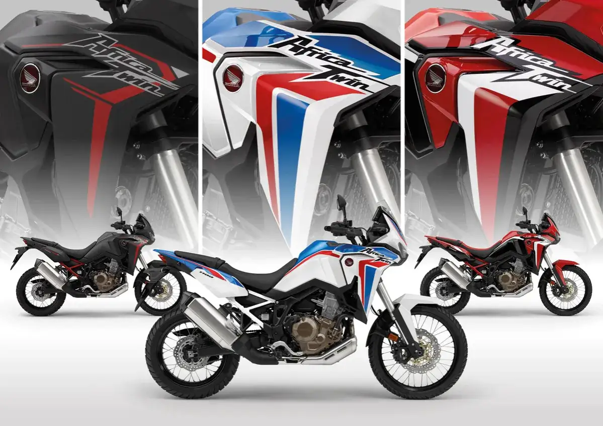 Tres Honda Africa Twin 2026 en rojo, blanco/azul y negro. Listas para la aventura.